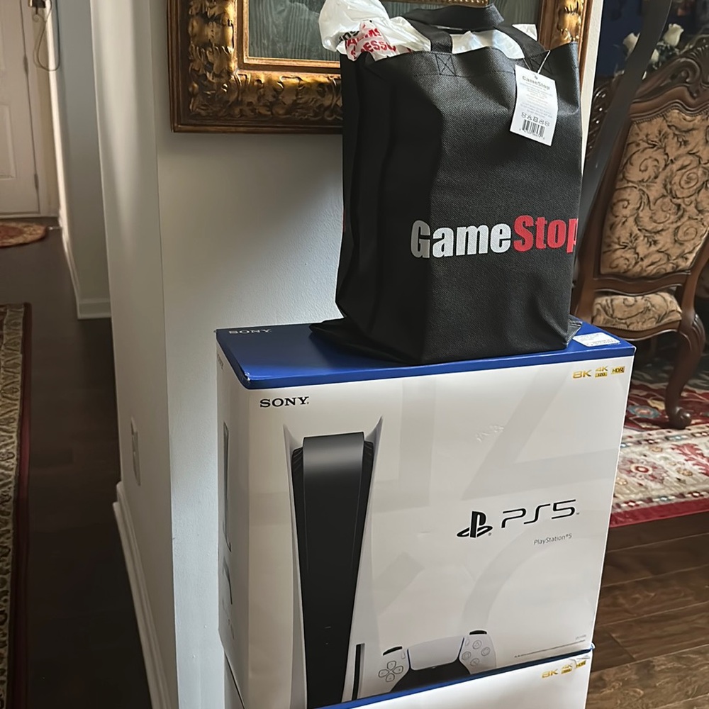 Sony PS5 video game with one controller and two games